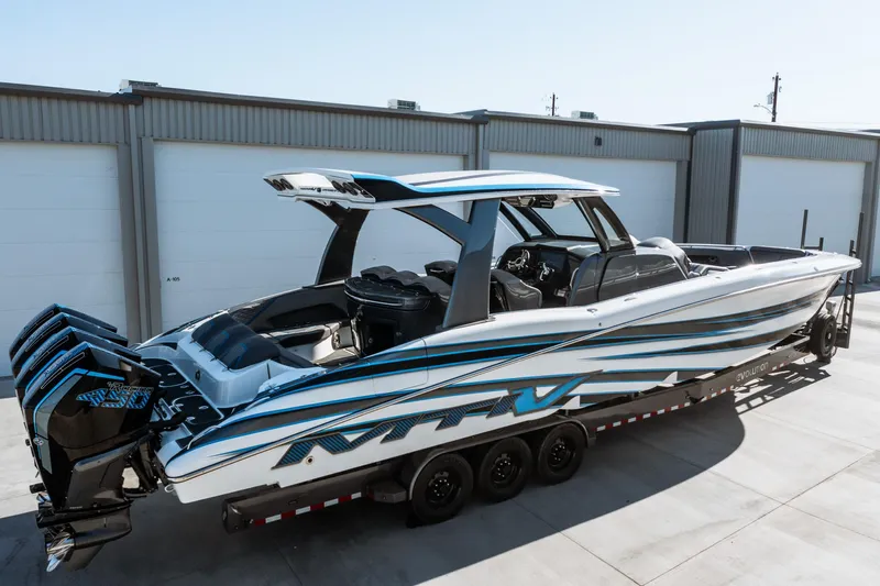  Yacht Photos Pics 2023 MTI V42 boat with quad engines on a trailer.