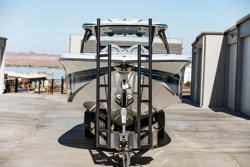  Yacht Photos Pics 2023 MTI V42 boat on trailer in storage facility.