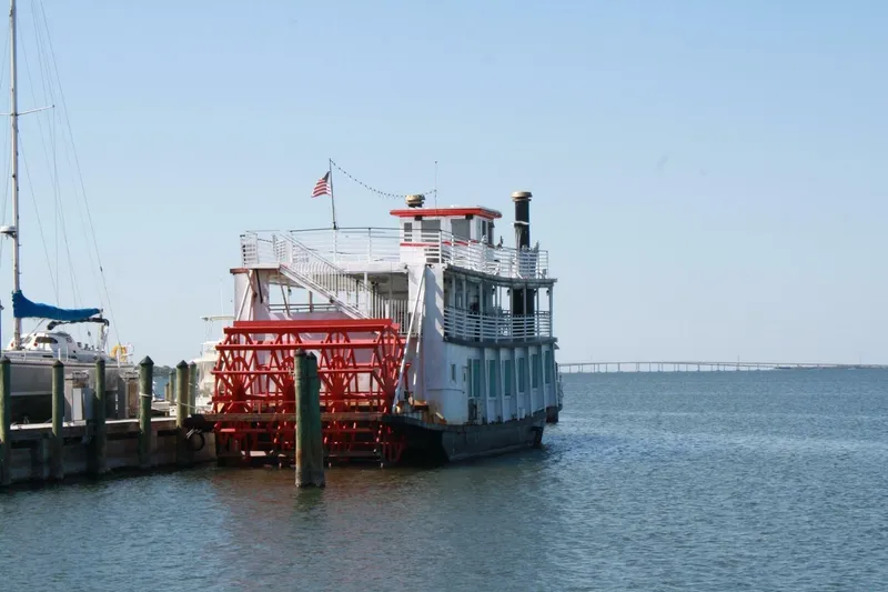 Indian River Queen Yacht Photos Pics Vintage 1984 custom paddle wheel boat docked by the water.