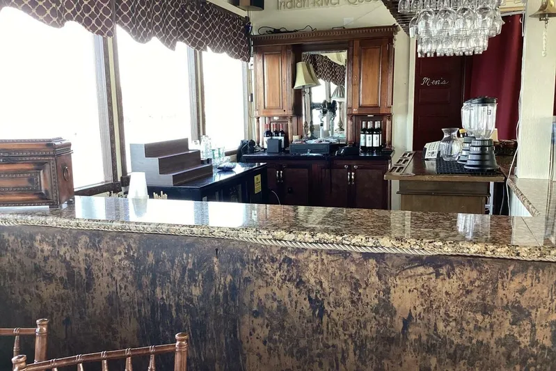 Indian River Queen Yacht Photos Pics Luxurious vintage bar interior with wooden cabinets and granite countertop, Custom Paddle Wheel, 1984.