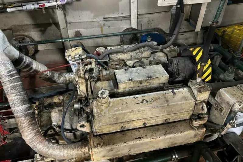 Indian River Queen Yacht Photos Pics 1984 Custom Paddle Wheel engine with visible pipes and mechanical components.