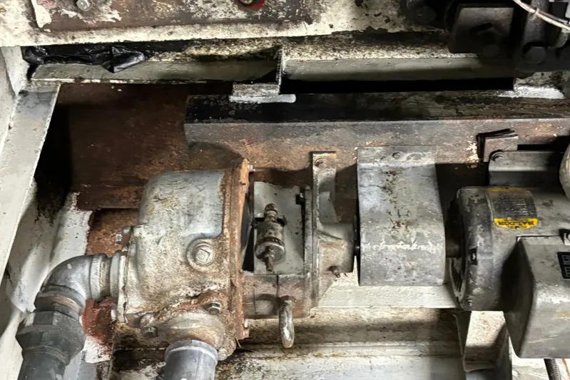 Indian River Queen Yacht Photos Pics Rusty mechanical components of a 1984 Custom Paddle Wheel, showing wear and age.