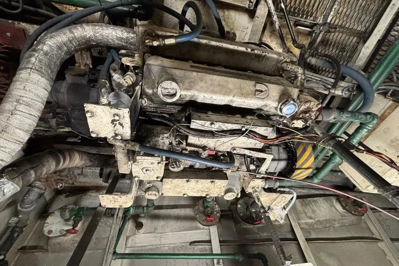 Indian River Queen Yacht Photos Pics Old custom paddle wheel engine from 1984 with visible pipes and wiring.