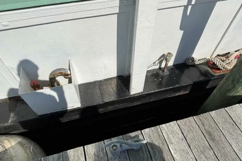 Indian River Queen Yacht Photos Pics Docked custom paddle wheel boat from 1984 with ropes and metal fixtures.