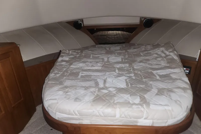 Teddy B Yacht Photos Pics Cozy cabin bed in 1997 Mainship 350 Trawler with quilted mattress.