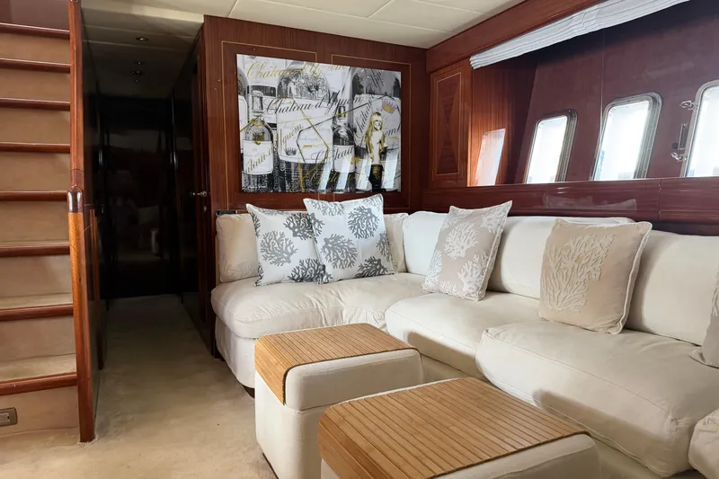  Yacht Photos Pics Luxurious interior of 2004 Mangusta 72 yacht with elegant seating and decor.