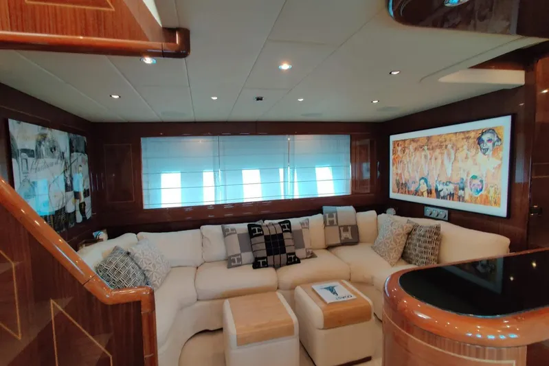  Yacht Photos Pics Luxurious interior of 2004 Mangusta 72 yacht with elegant seating and modern artwork.