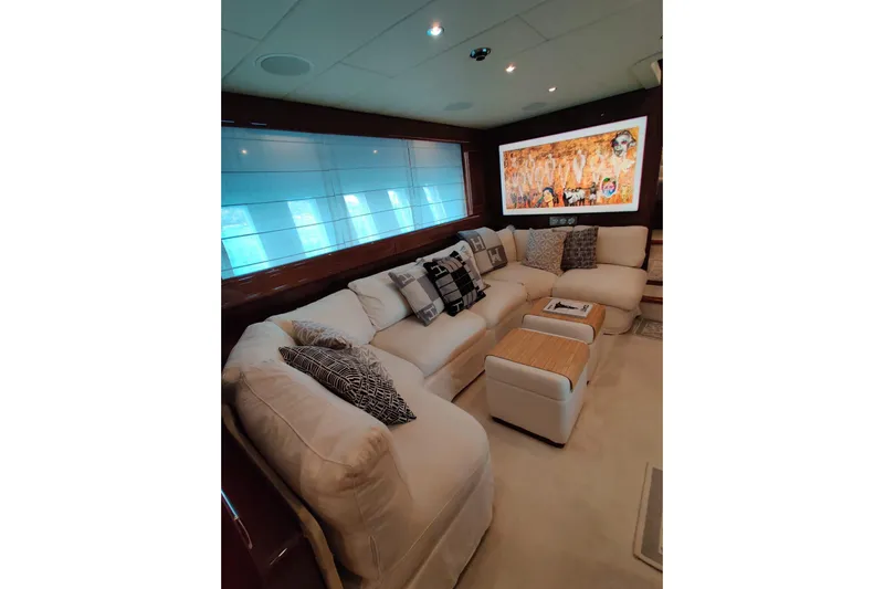  Yacht Photos Pics Luxurious interior of 2004 Mangusta 72 yacht with plush seating and modern decor.