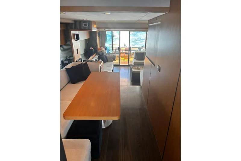 Big Blue Yacht Photos Pics Interior of 2014 Fairline Squadron 78 Custom yacht with modern furnishings and ocean view.