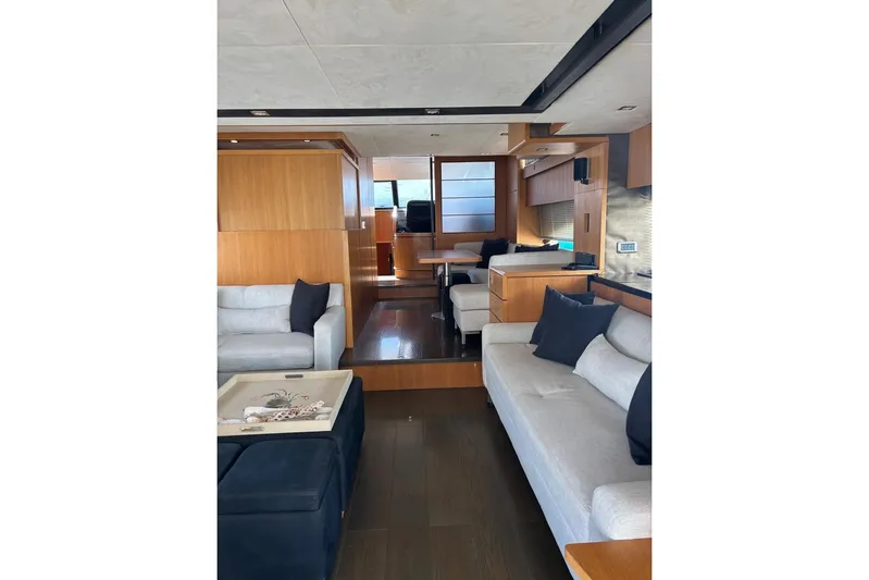 Big Blue Yacht Photos Pics Luxurious interior of 2014 Fairline Squadron 78 Custom yacht with modern furnishings.