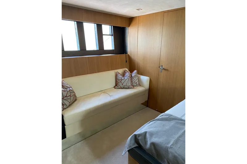 Big Blue Yacht Photos Pics Luxurious interior of 2014 Fairline Squadron 78 Custom yacht with cozy seating area.