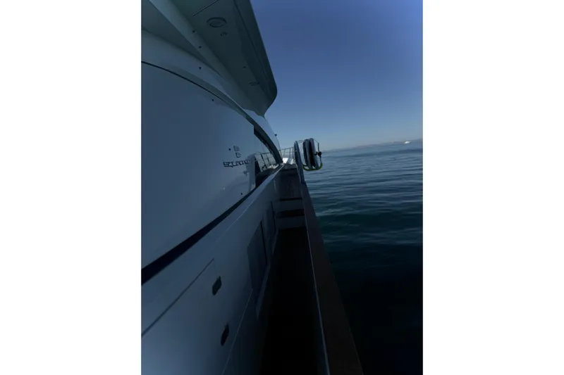 Big Blue Yacht Photos Pics 2014 Fairline Squadron 78 Custom yacht side view on calm sea.