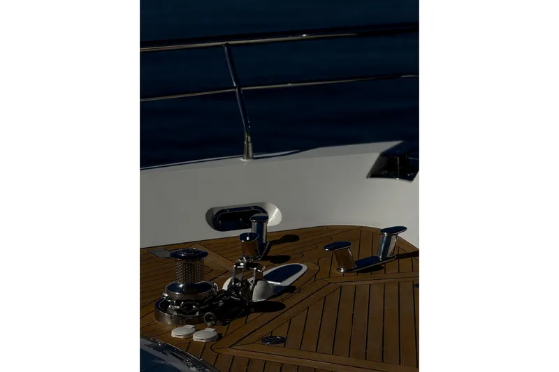 Big Blue Yacht Photos Pics 2014 Fairline Squadron 78 Custom yacht deck with polished wood and metal fittings.