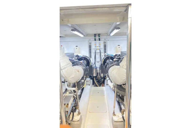 Big Blue Yacht Photos Pics Engine room of 2014 Fairline Squadron 78 Custom yacht, showcasing dual engines and equipment.