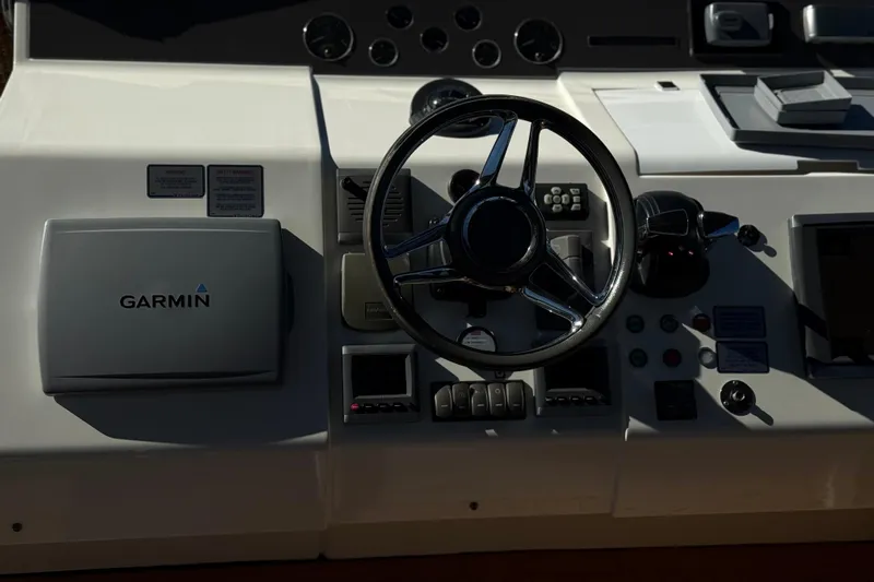 Big Blue Yacht Photos Pics Control panel of 2014 Fairline Squadron 78 Custom yacht with Garmin navigation system.