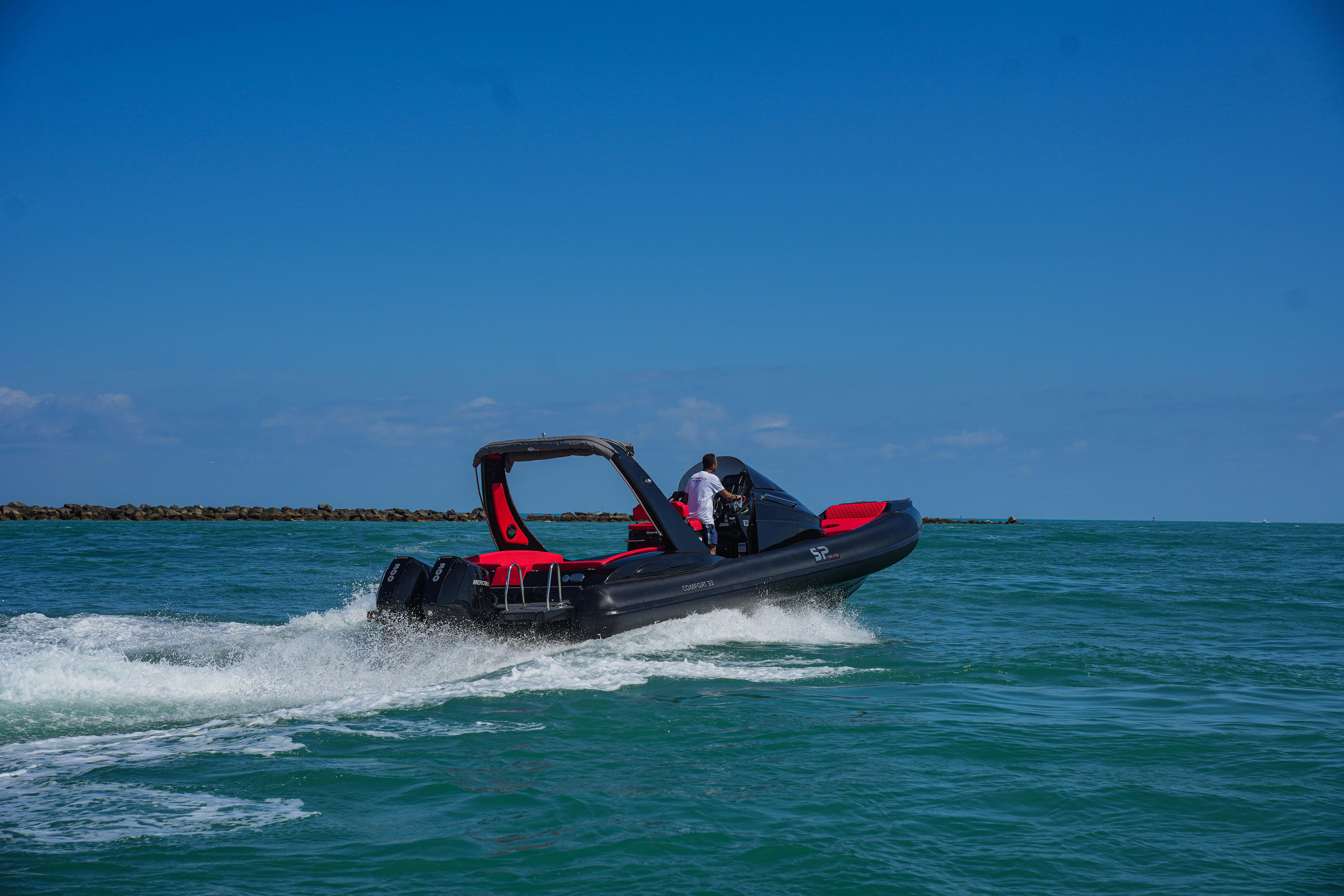 2025 Sea Prop COMFORT 33 speedboat cruising on open water.