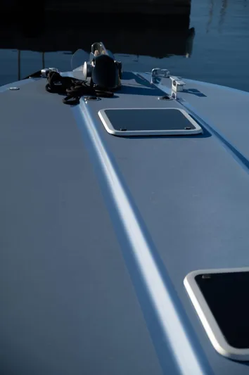Azaxaki Yacht Photos Pics Sleek deck of 1995 Magnum 50 Bestia boat with modern fittings.