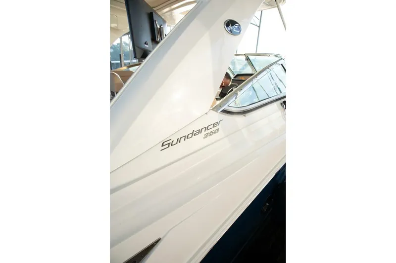  Yacht Photos Pics 2016 Sea Ray 350 Sundancer boat side view with logo and sleek design.