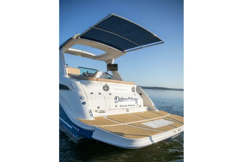  Yacht Photos Pics 2016 Sea Ray 350 Sundancer yacht with extended swim platform on calm water.