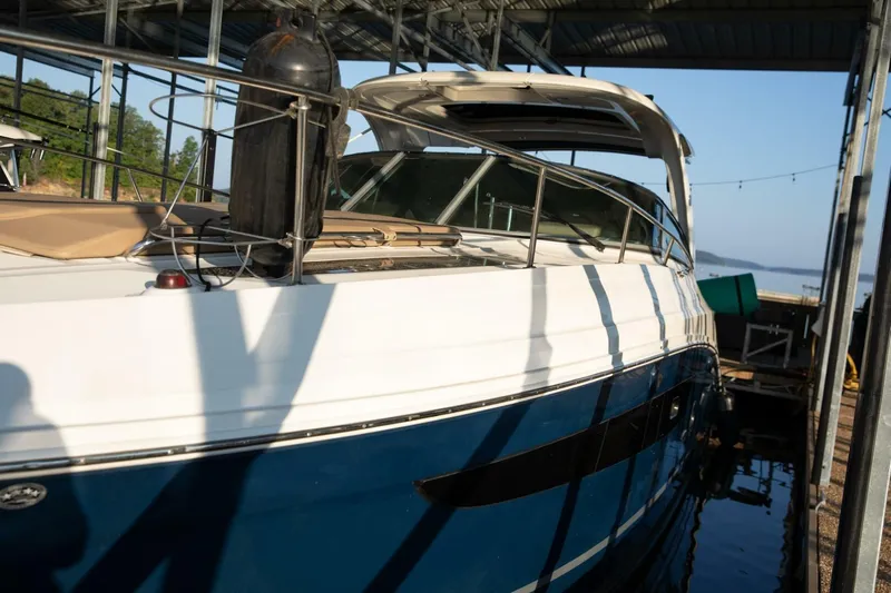  Yacht Photos Pics 2016 Sea Ray 350 Sundancer docked in a marina, side view.