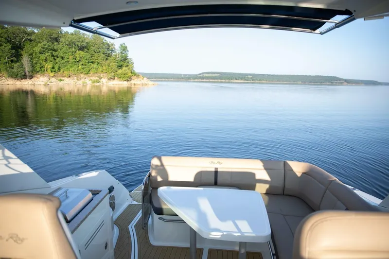  Yacht Photos Pics 2016 Sea Ray 350 Sundancer boat interior with lake view and seating area.