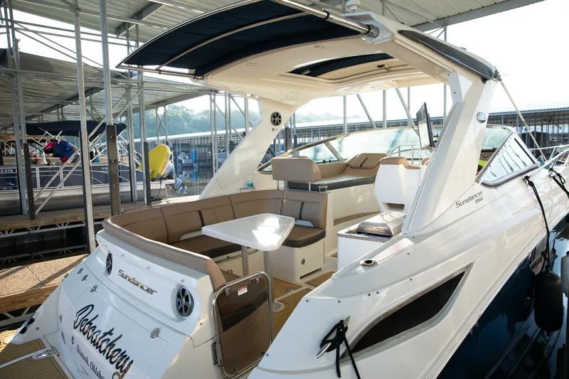  Yacht Photos Pics 2016 Sea Ray 350 Sundancer yacht docked, featuring spacious seating and modern design.