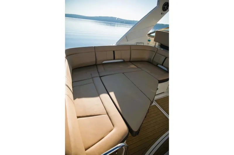  Yacht Photos Pics Luxurious seating area on 2016 Sea Ray 350 Sundancer yacht, overlooking calm waters.