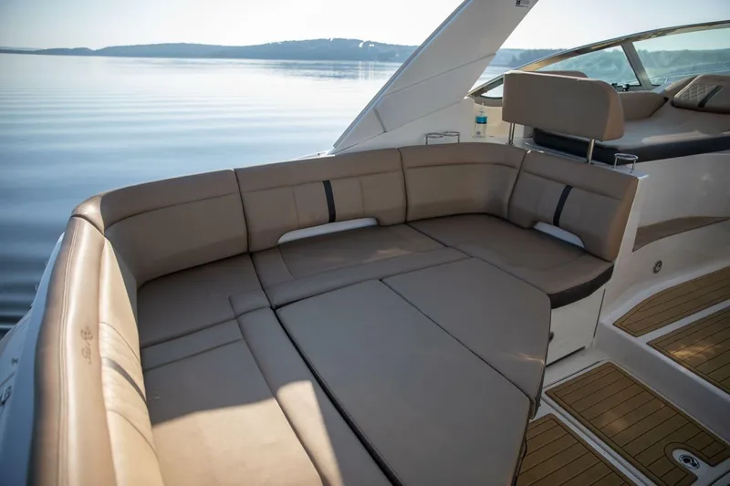  Yacht Photos Pics Luxurious seating on 2016 Sea Ray 350 Sundancer yacht, overlooking calm waters.