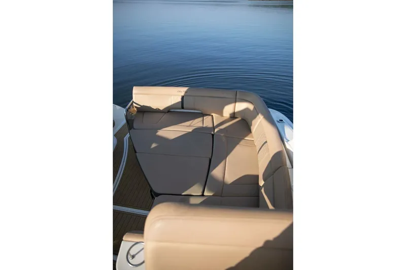  Yacht Photos Pics 2016 Sea Ray 350 Sundancer boat with beige seating on calm water.