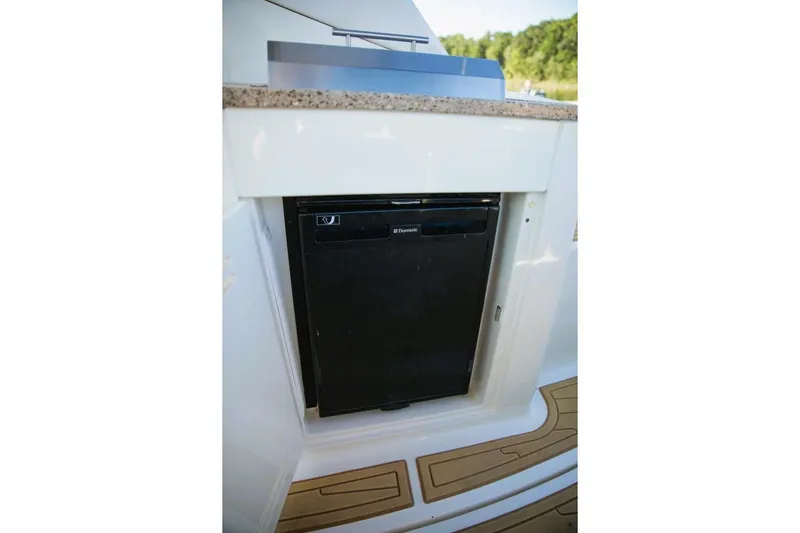  Yacht Photos Pics 2016 Sea Ray 350 Sundancer boat with built-in Dometic refrigerator.