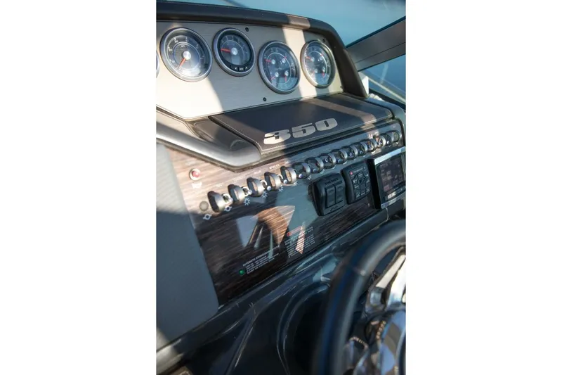  Yacht Photos Pics Dashboard of 2016 Sea Ray 350 Sundancer boat with gauges and controls.