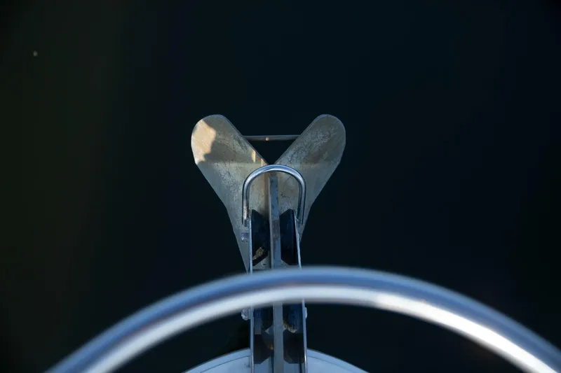  Yacht Photos Pics Bow view of 2016 Sea Ray 350 Sundancer anchor against dark water.