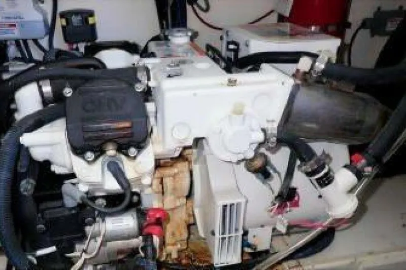  Yacht Photos Pics Engine compartment of a 2016 Sea Ray 350 Sundancer boat, showcasing mechanical components.