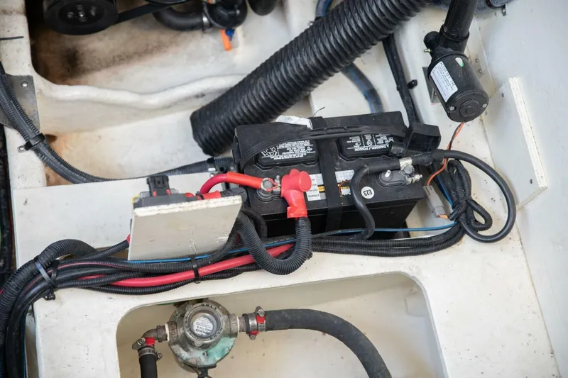 Yacht Photos Pics Engine compartment of 2016 Sea Ray 350 Sundancer showing battery and wiring setup.