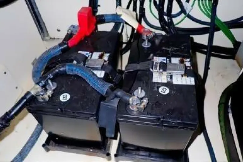  Yacht Photos Pics Batteries in a 2016 Sea Ray 350 Sundancer boat engine compartment.