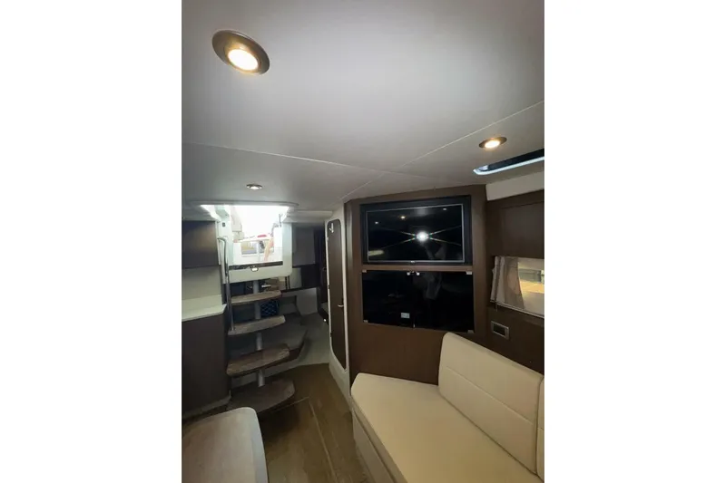  Yacht Photos Pics Interior of 2016 Sea Ray 350 Sundancer yacht with modern seating and entertainment area.