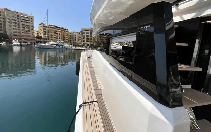  Yacht Photos Pics 2021 Pardo Yachts E60 docked in marina, showcasing sleek design and modern architecture.