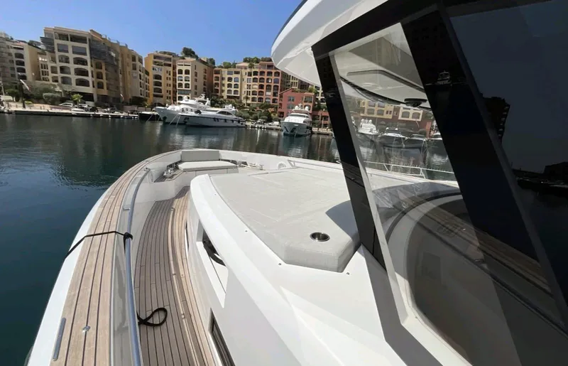  Yacht Photos Pics Luxury 2021 Pardo Yachts E60 docked in a scenic marina.