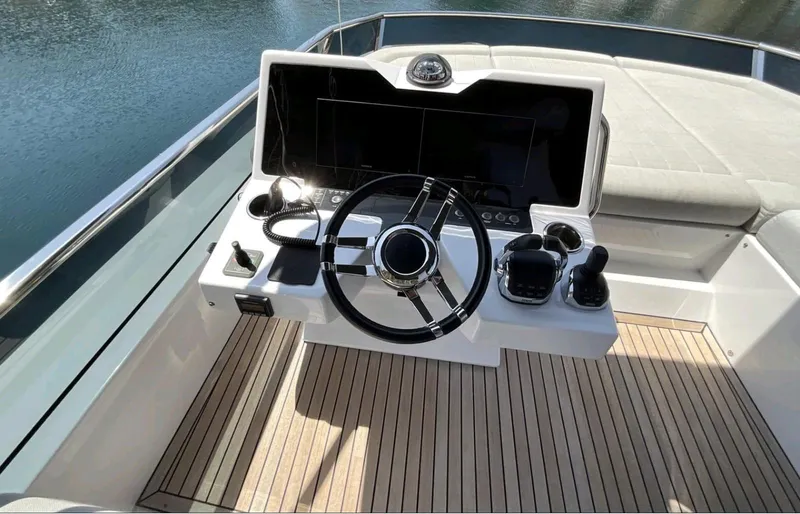  Yacht Photos Pics Helm of 2021 Pardo Yachts E60 with modern controls and sleek design.