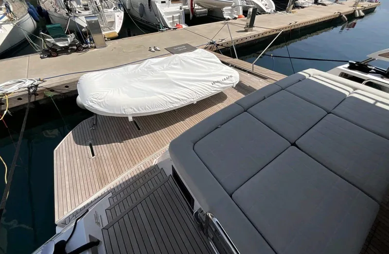  Yacht Photos Pics 2021 Pardo Yachts E60 deck with covered equipment at marina.