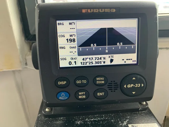  Yacht Photos Pics Navigation display on 1955 Tugboat L-T 100 Steel Army, showing coordinates and course.