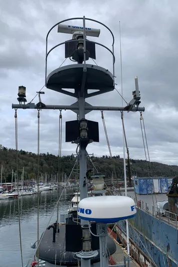  Yacht Photos Pics 1955 Tugboat L-T 100 Steel Army Tug with radar equipment, docked in a marina.