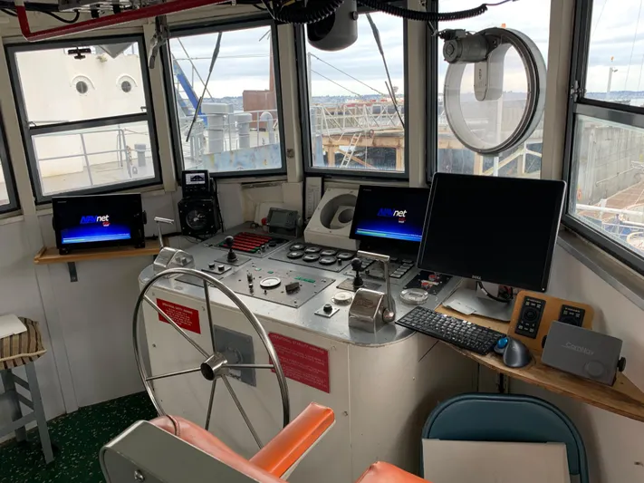  Yacht Photos Pics 1955 Tugboat L-T 100 Steel Army Tug control room with modern navigation equipment.