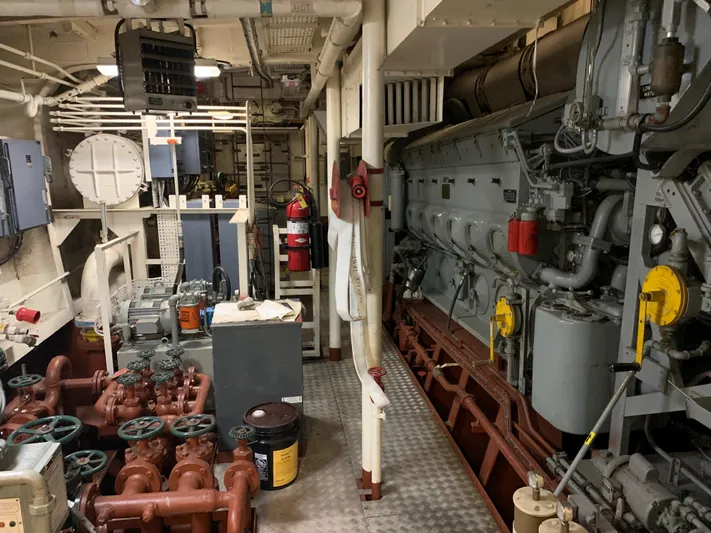  Yacht Photos Pics Engine room of 1955 Tugboat L-T 100 Steel Army Tug, featuring machinery and control systems.