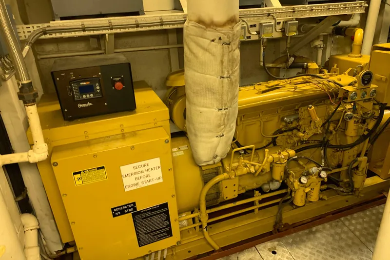  Yacht Photos Pics Engine room of 1955 Tugboat L-T 100 Steel Army Tug, featuring machinery and control panel.