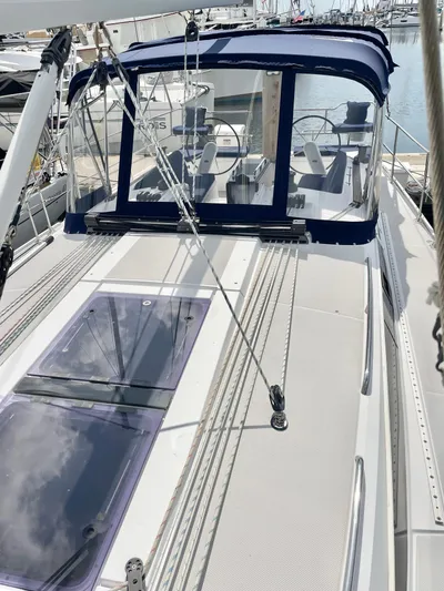  Yacht Photos Pics 2017 Catalina 425 sailboat with blue canopy, docked at marina.