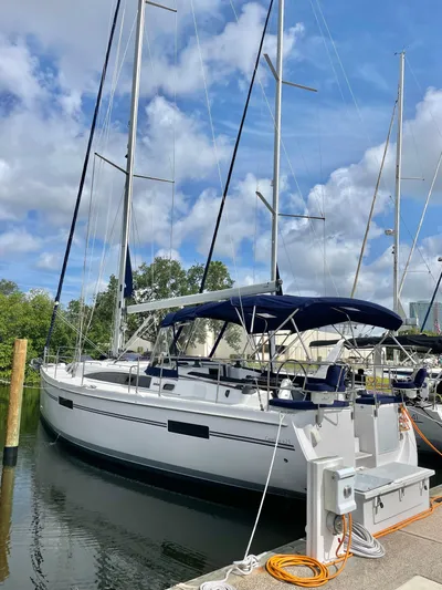  Yacht Photos Pics 2017 Catalina 425 sailboat docked at marina under blue sky.