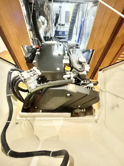  Yacht Photos Pics Engine compartment of a 2017 Catalina 425 sailboat, showcasing mechanical components and wiring.