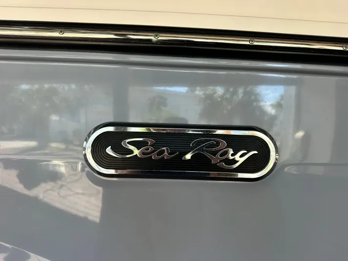  Yacht Photos Pics 2024 Sea Ray 260 SLX OB boat logo on gray background.