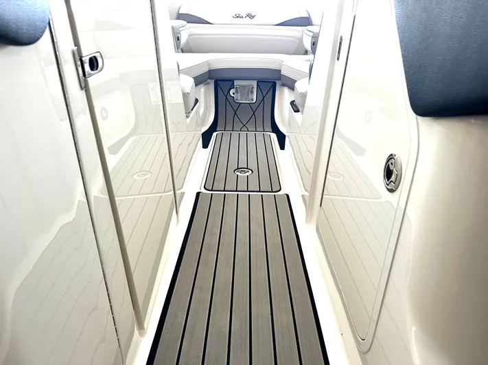  Yacht Photos Pics Interior of 2024 Sea Ray 260 SLX OB with sleek wood flooring.